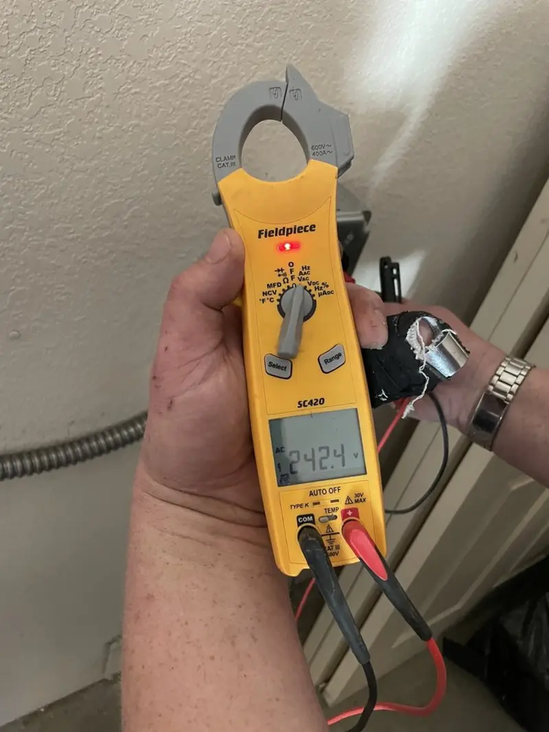 Voltage testing with clamp meter during Generator Installation in Fort Mohave